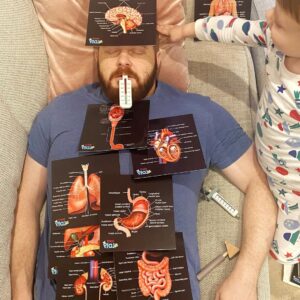 Father and Child Playing Educational Role Play Game using Teddo Play Human Anatomy Learning Kit
